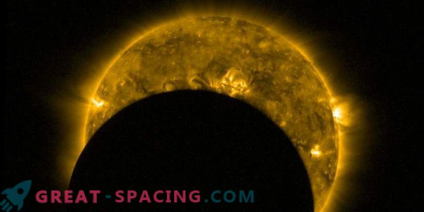 Vue de l'espace: éclipse solaire partielle