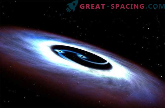 Les trous noirs tournent autour d'un quasar dans une bataille mortelle
