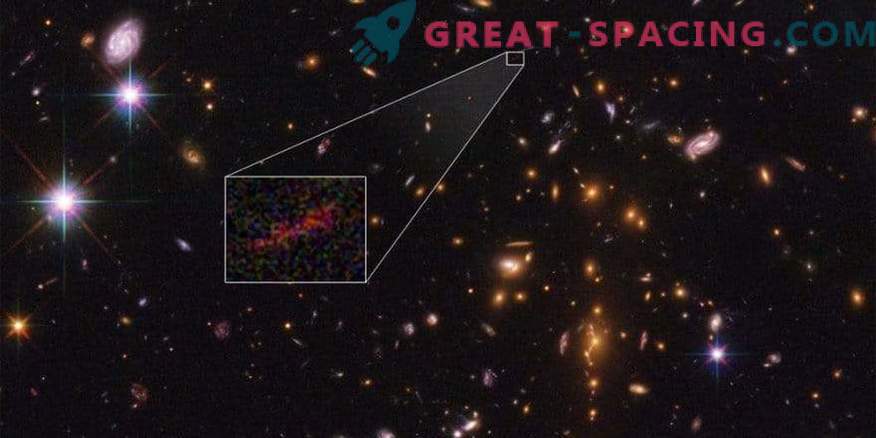 Hubble et Spitzer sont combinés pour obtenir une image améliorée d'une galaxie lointaine